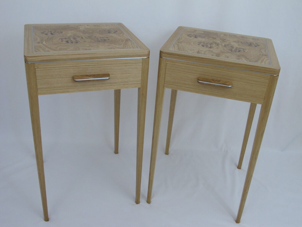 Oak bedside tables with pippy oak book matched tops and aluminium highlights